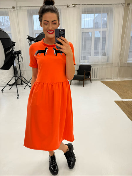 Orange dress with wolf embroidery