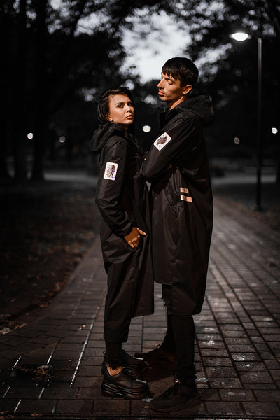 Black raincoat / King of Clubs